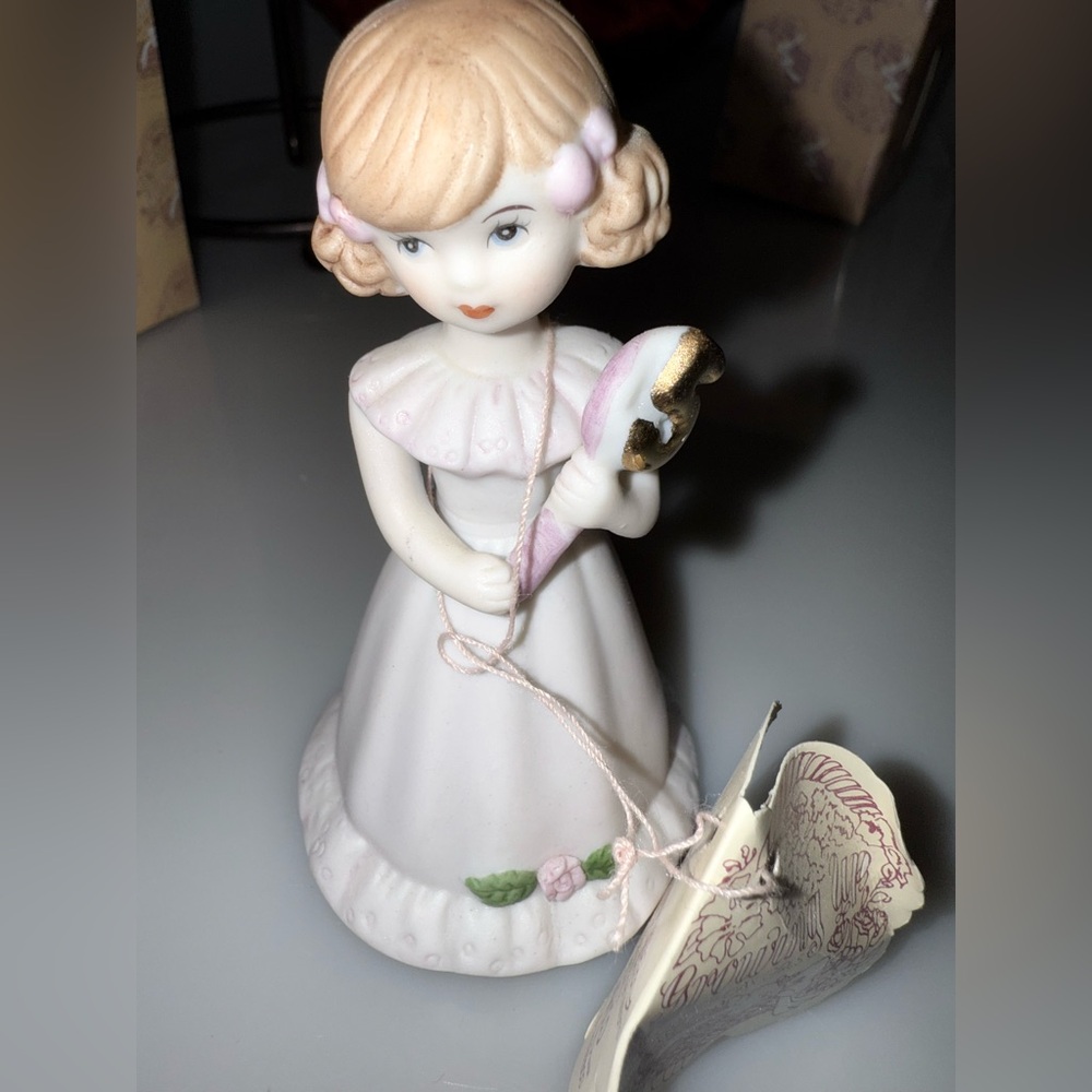 Porcelain Girl Figurine with Pink and White Dress